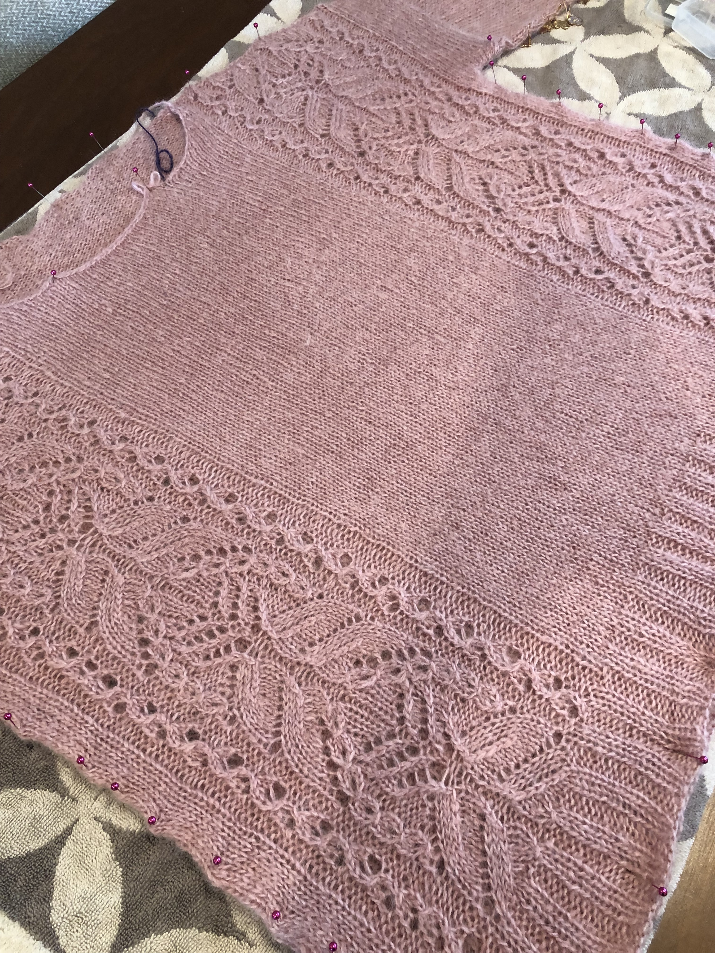 Pink Fizz handmade knitted sweater in pink pinned on blocking mat