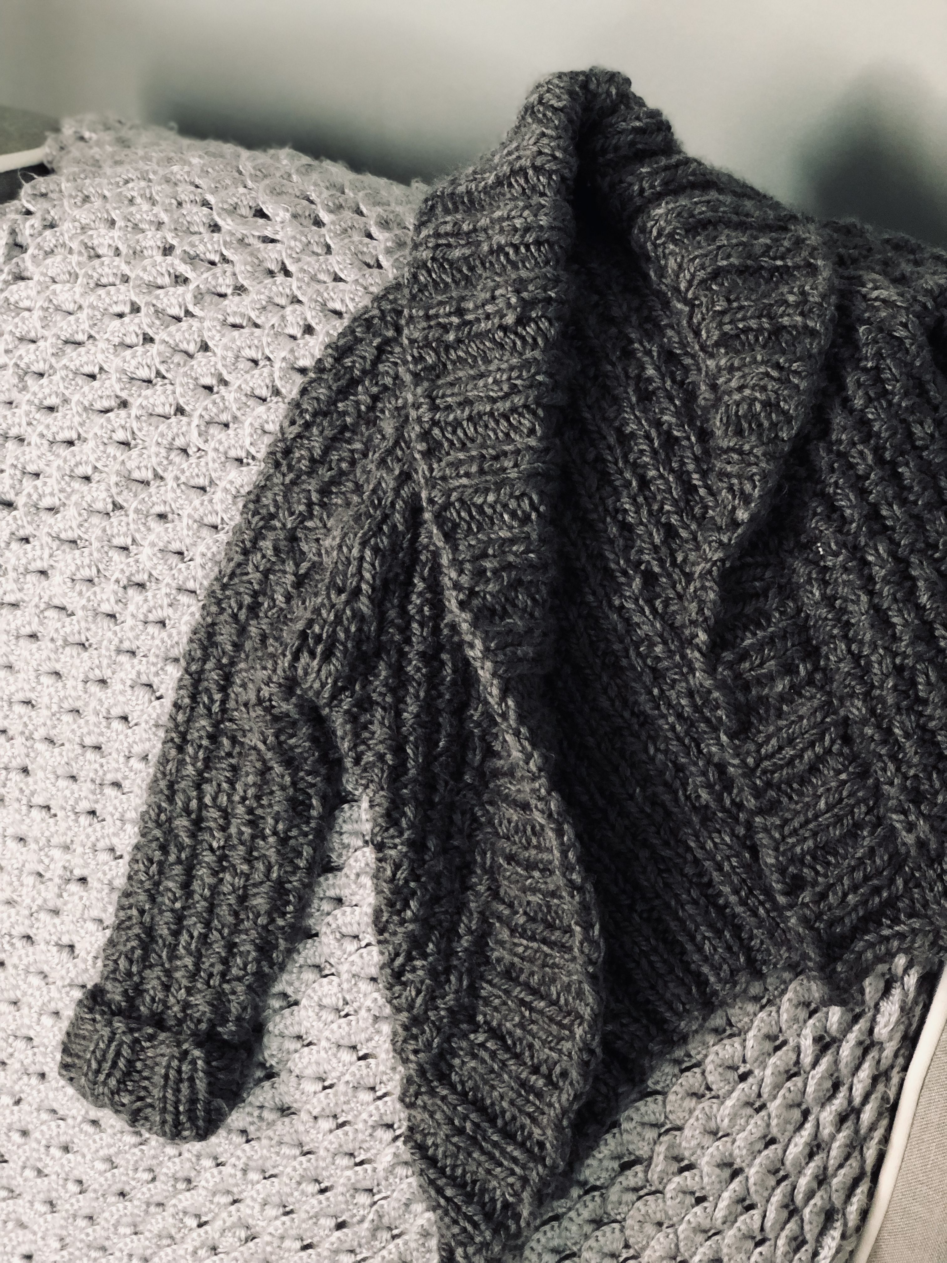 Finished Oxbow Cardigan handmade knitted sweater. Knit is soft and squishy in a medium grey tone. Knitted in a toddler size.