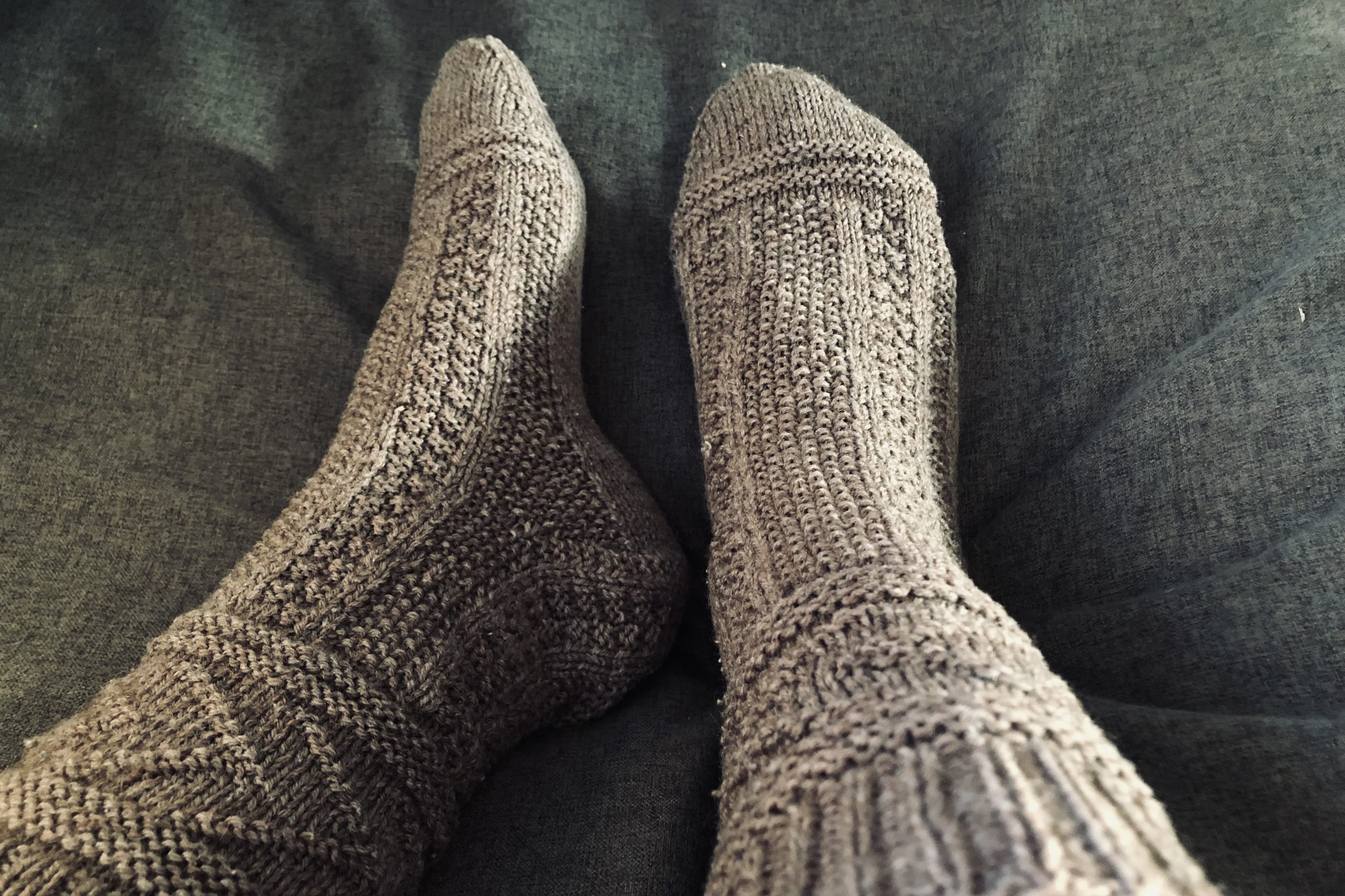 Handmade knitted sock pattern called Gladys on my feet